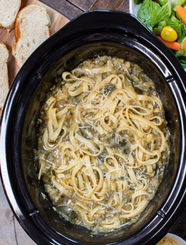 fettuccine with bolognese sauce mixed in, in slow cooker.