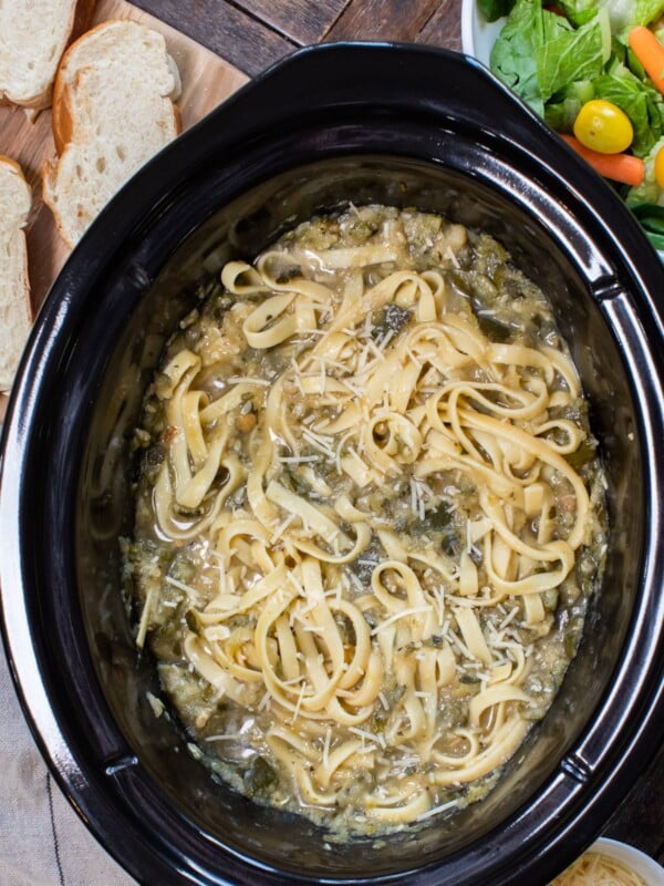 fettuccine with bolognese sauce mixed in, in slow cooker.