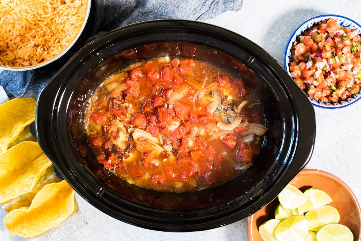 done cooking chicken tinga in slow cooker before shreddeding