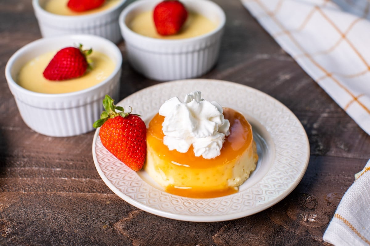 plated flan with caramel on top.