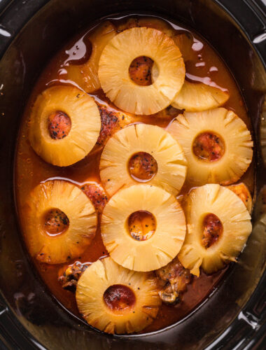 close up of barbecue pineapple chicken in slow cooker