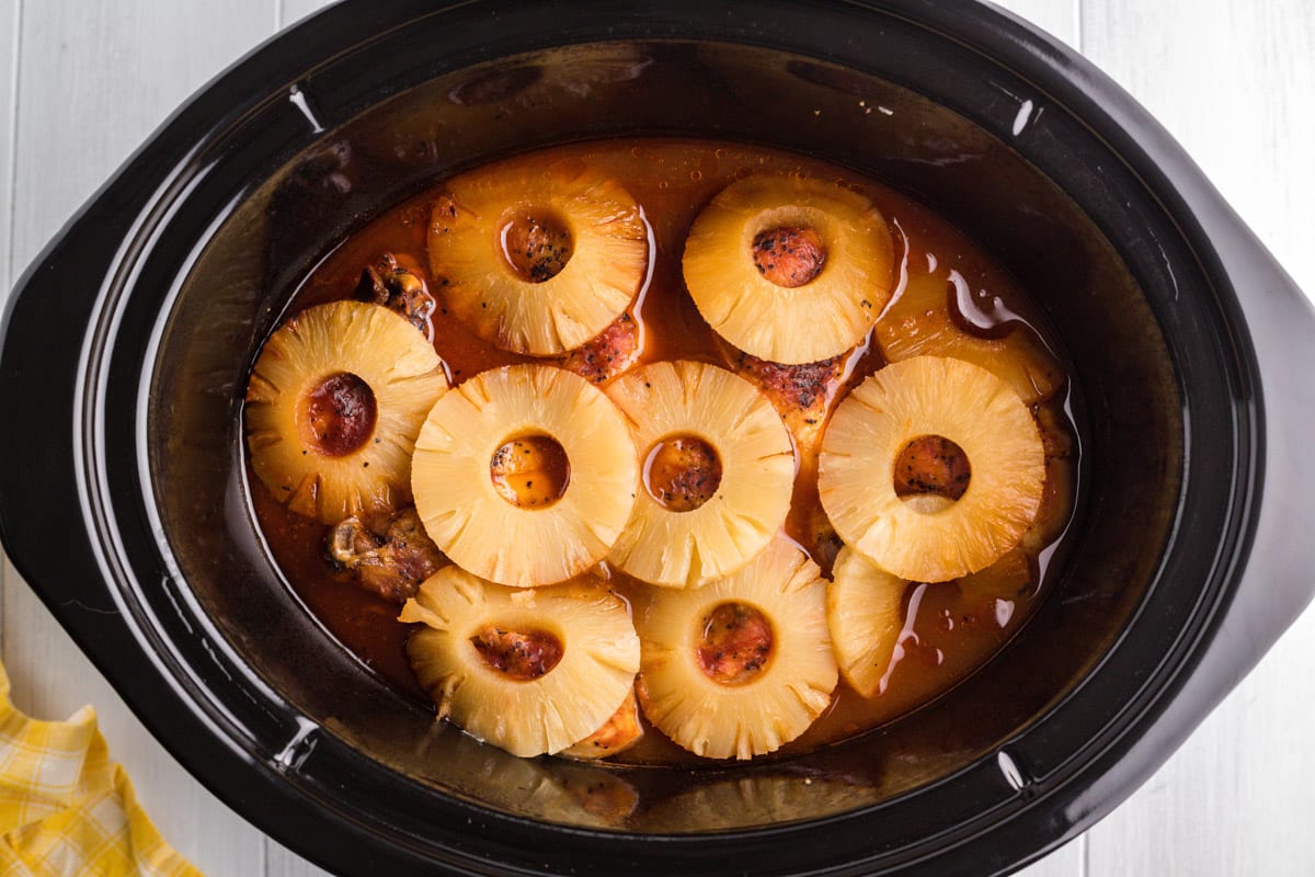 cooked pineapple bbq chicken in a slow cooker