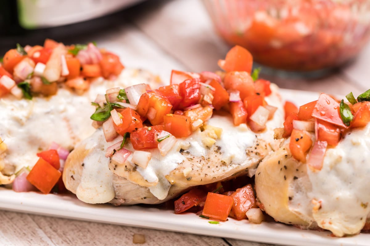 close up of bruschetta chicken plated