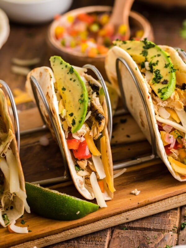 chicken fajitas on a taco stand