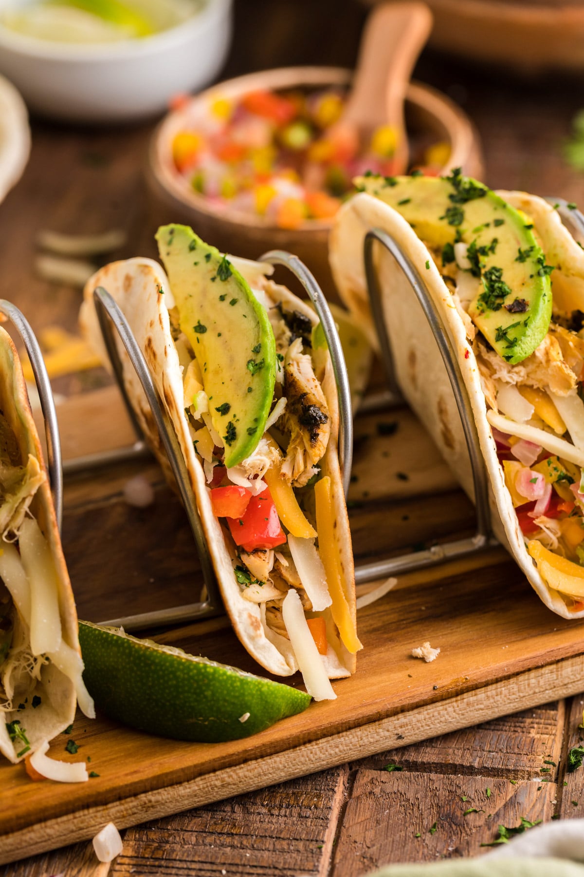 chicken fajitas on a taco stand