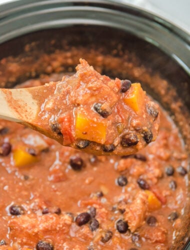 turkey butternut squash chili on wooden spoon