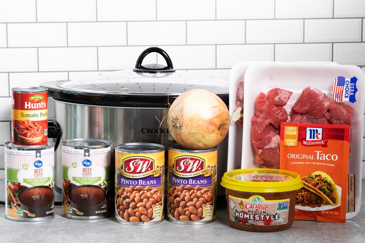 ingredients for steakhouse chili in front of a slow cooker