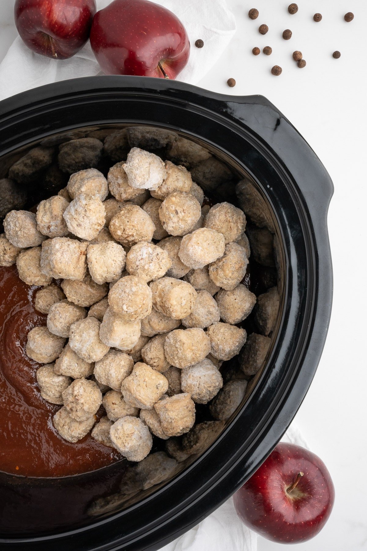 meatballs added to crockpot with the apple butter mixture.