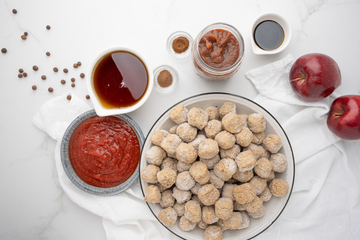 ingredients for apple butter meatballs on table.