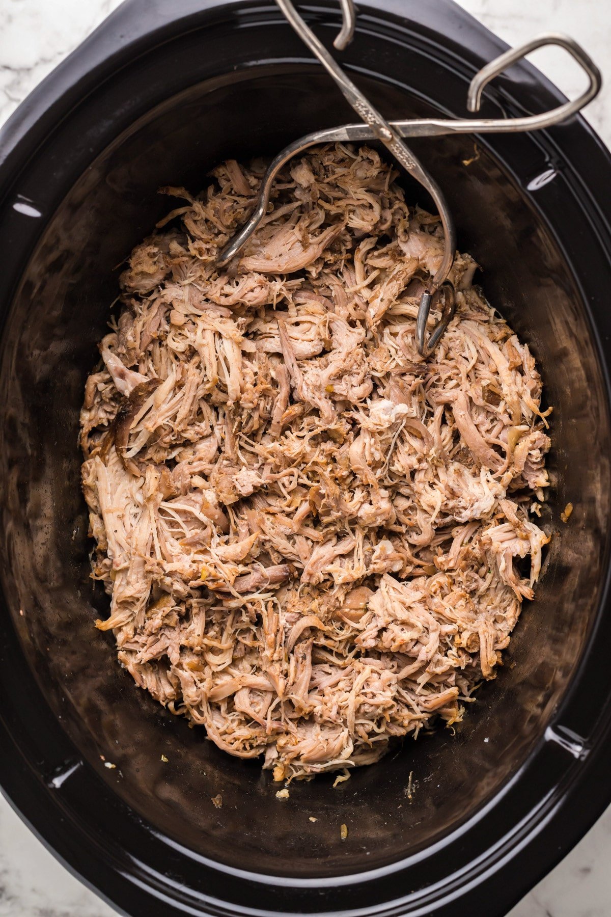 shredded Mississippi pork in a crockpot