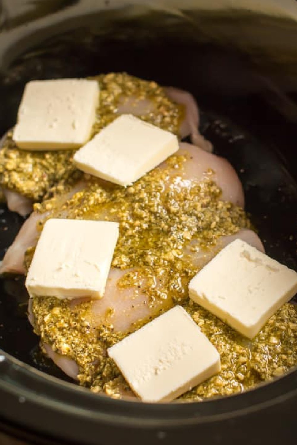 close up of pesto mozzarella chicken.
