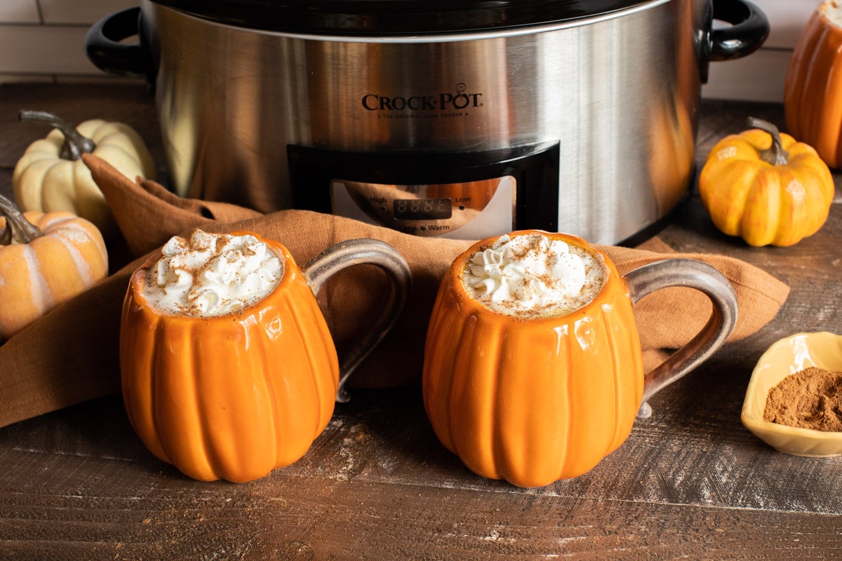 pumpkin lattes in pumpkin mugs