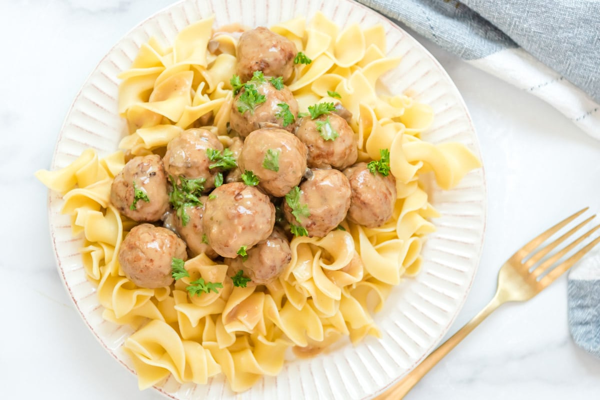 swedish meatballs on a a white plate
