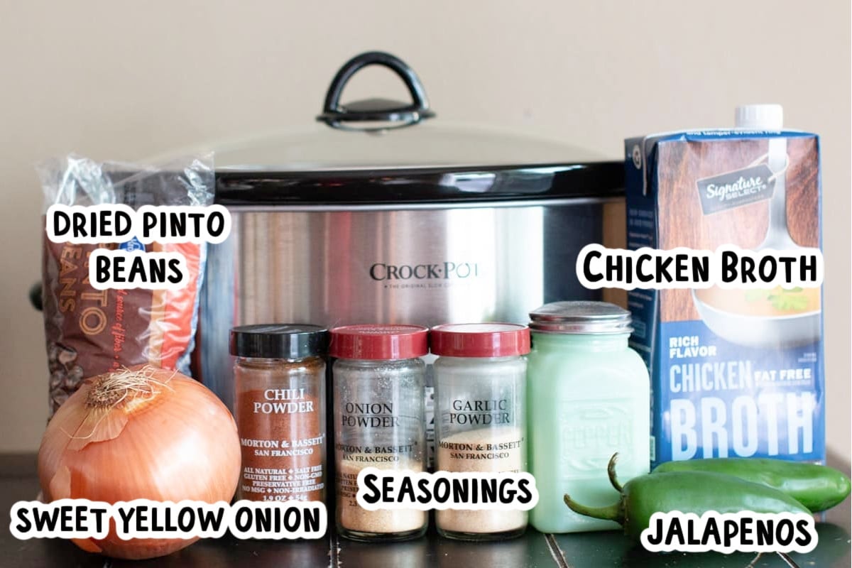 ingredients for spicy pinto beans in front of slow cooker