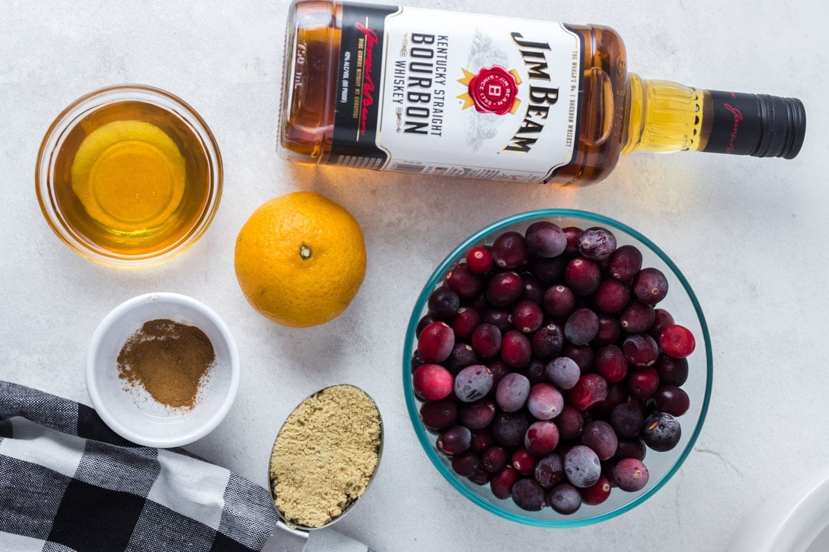 ingredients for bourbon cranberry on table