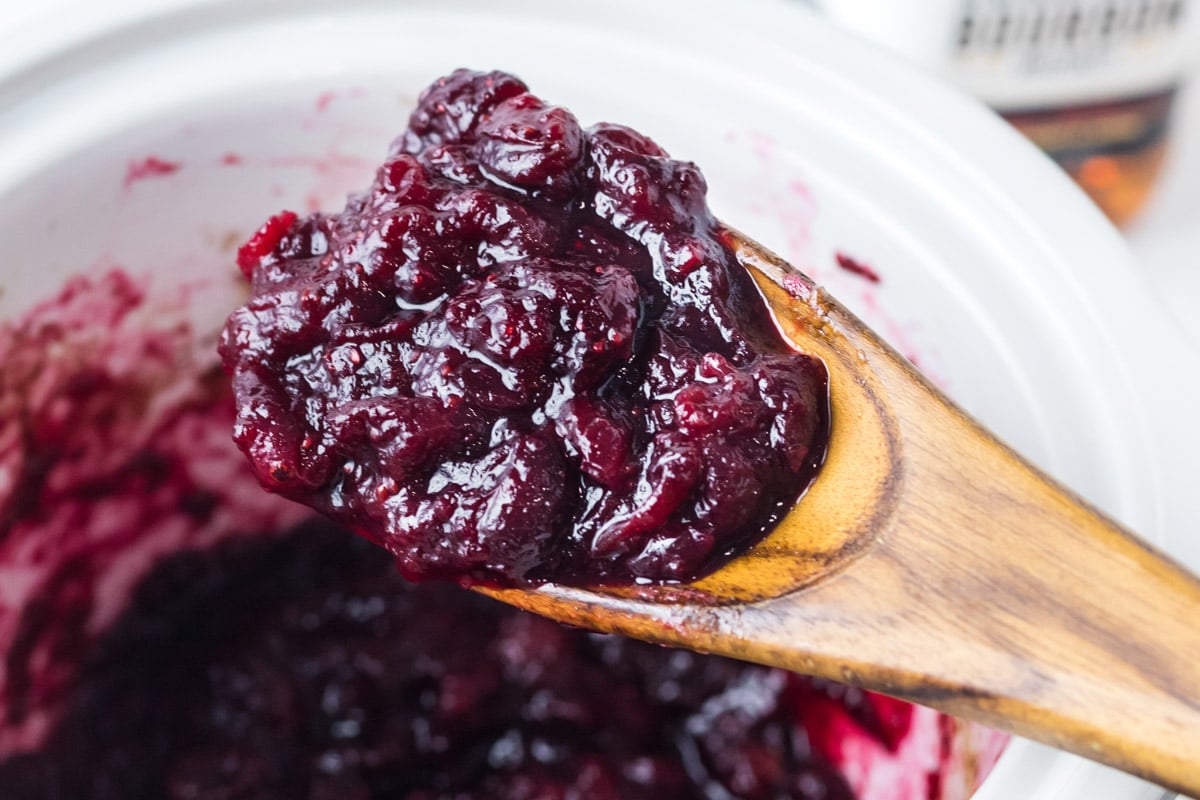cranberry sauce on wooden spoon
