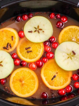 overhead shot of wassail in slow cooker