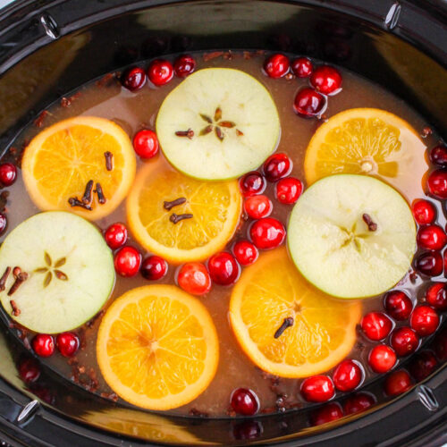 overhead shot of wassail in slow cooker