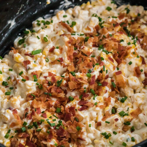 creamed corn cooked in slow cooker with bacon on top.