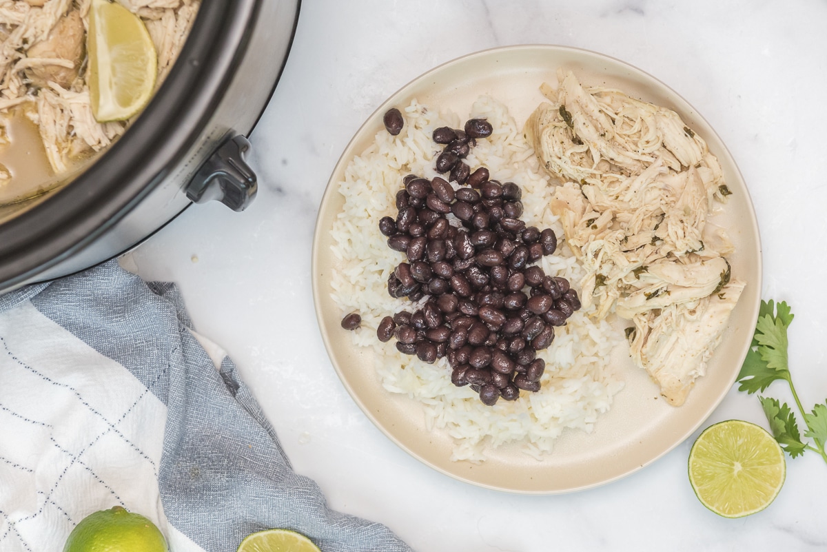 plate of cilantro lime chicken with black beans and rice