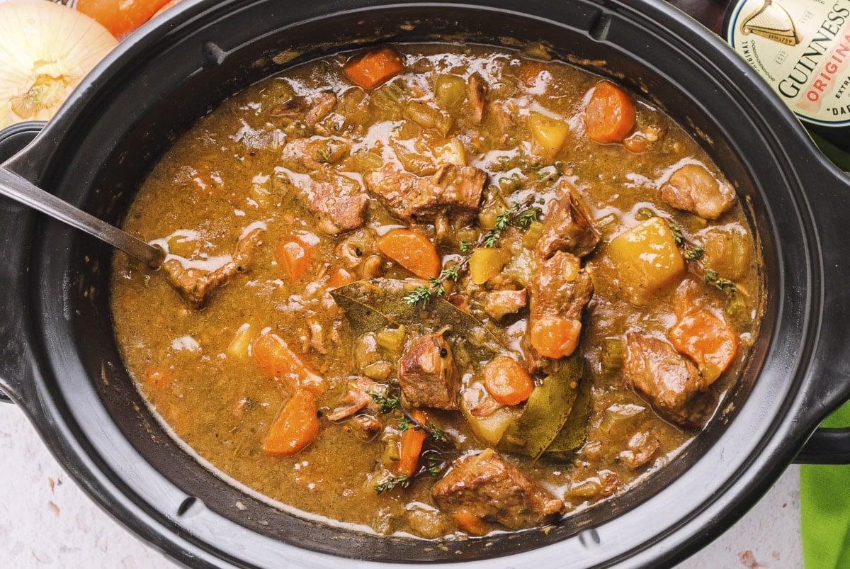 close up of guinness beef stew in a crockpot