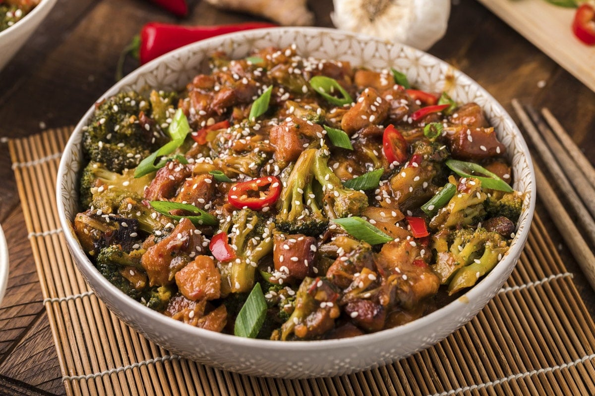 bowl of mongolian chicken on place mat