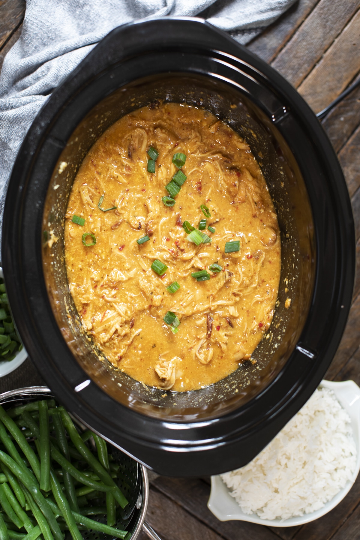 overhead shot of sweet chili chicken in the slow cooker