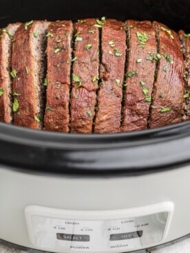 side view of meatloaf in slow cooker
