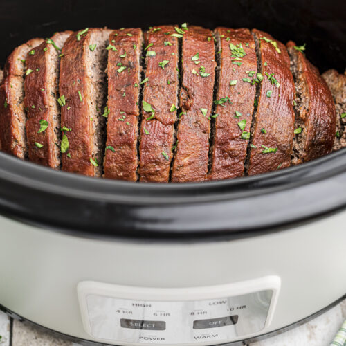 side view of meatloaf in slow cooker
