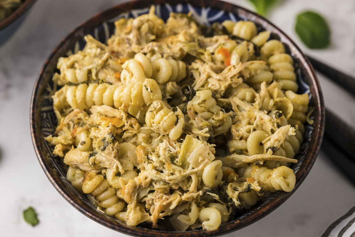 bowl of chicken spinach artichoke pasta