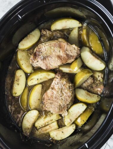 pork chops and apples done cooking in slow cooker.