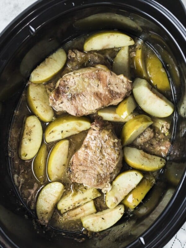 pork chops and apples done cooking in slow cooker.