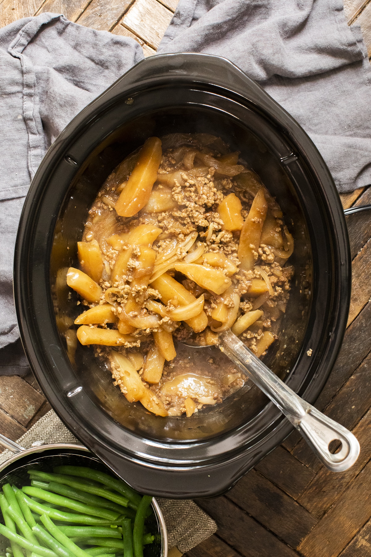 beef, potatoes, onions and gravy cooked in slow cooker