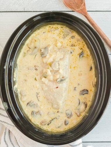 pork loin in creamy green chile sauce in slow cooker