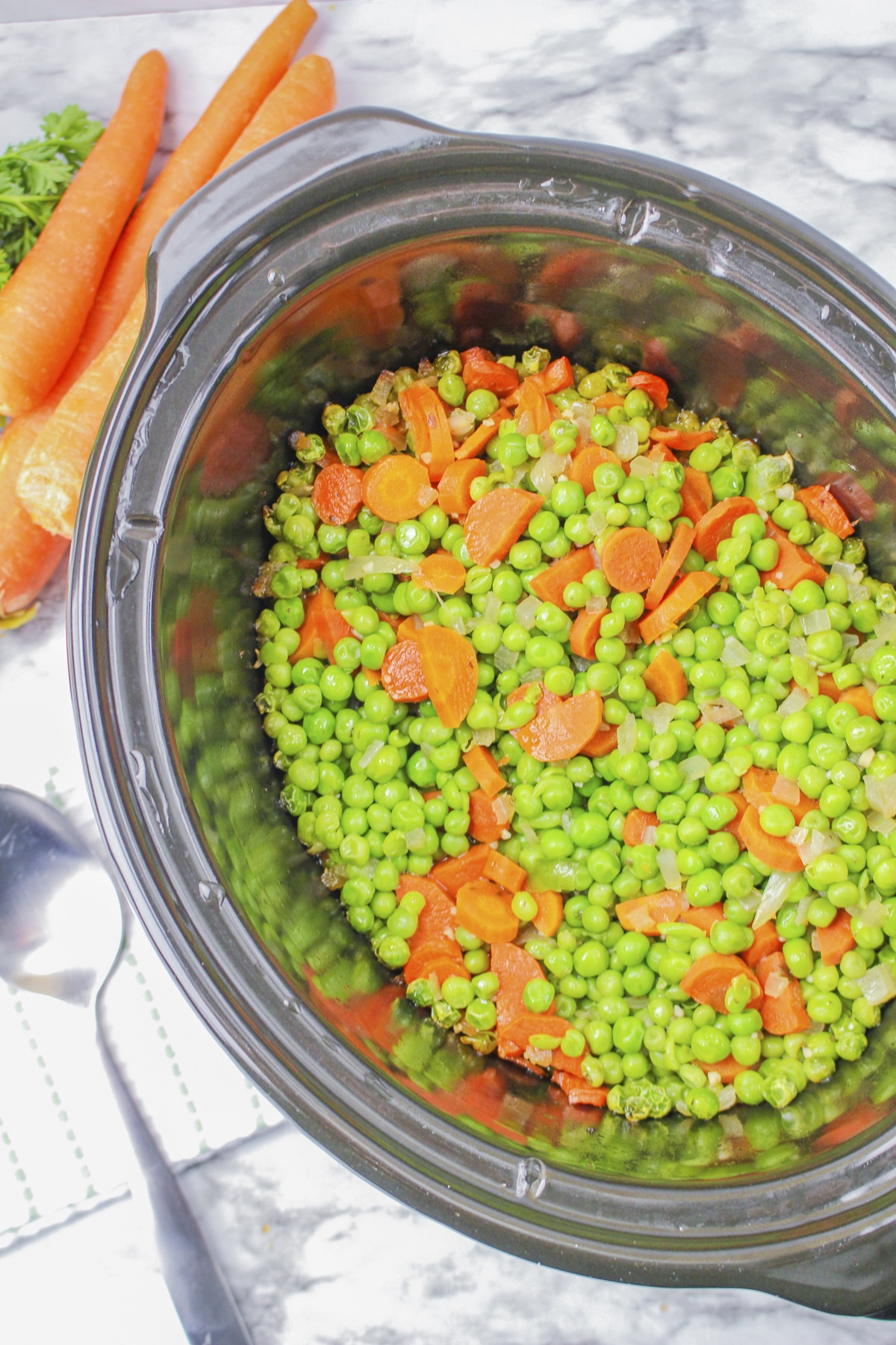 Peas and carrots cooked in the slow cooker