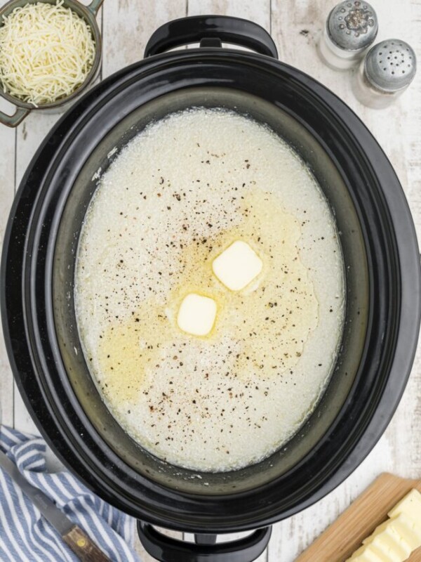 grits in the slow cooker with butter on top.