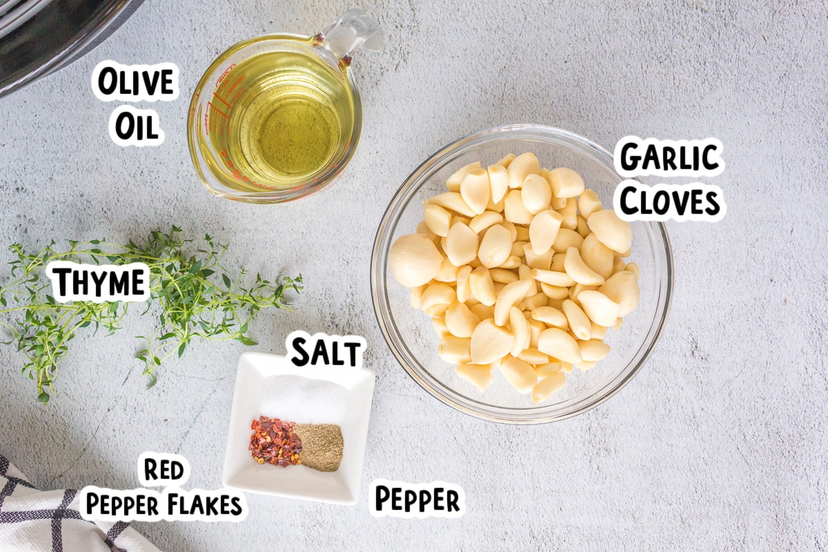 ingredients for garlic confit with text over lay.