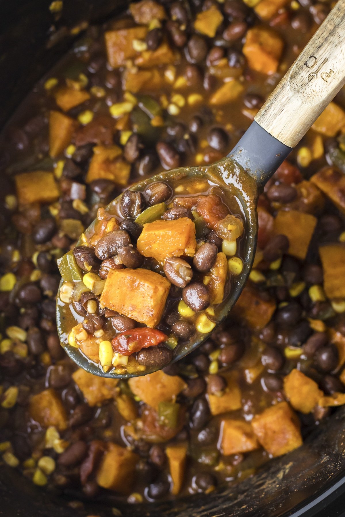 sweet potato black bean chili on spoon.