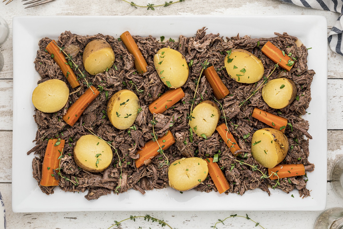 platter of shredded venison and vegetables.