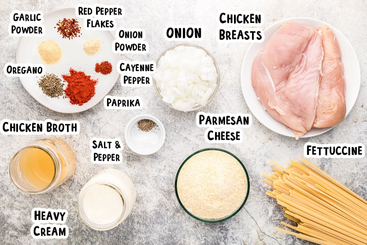 Ingredients for cajun chicken fettuccine with text.
