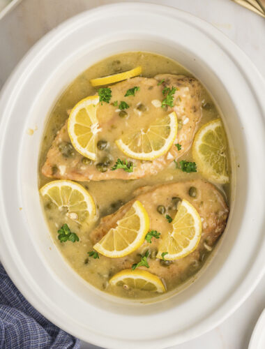 Close up of chicken piccata in the slow cooker.