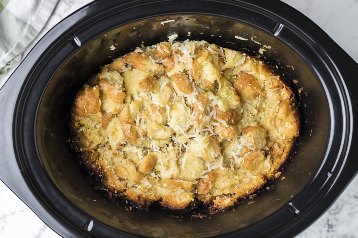 Bread pudding in slow cooker with coconut.