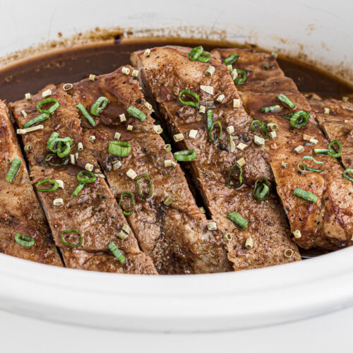 close up of dr. pepper ribs with green onion