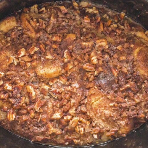 close up of cooked french toast casserole in slow cooker.