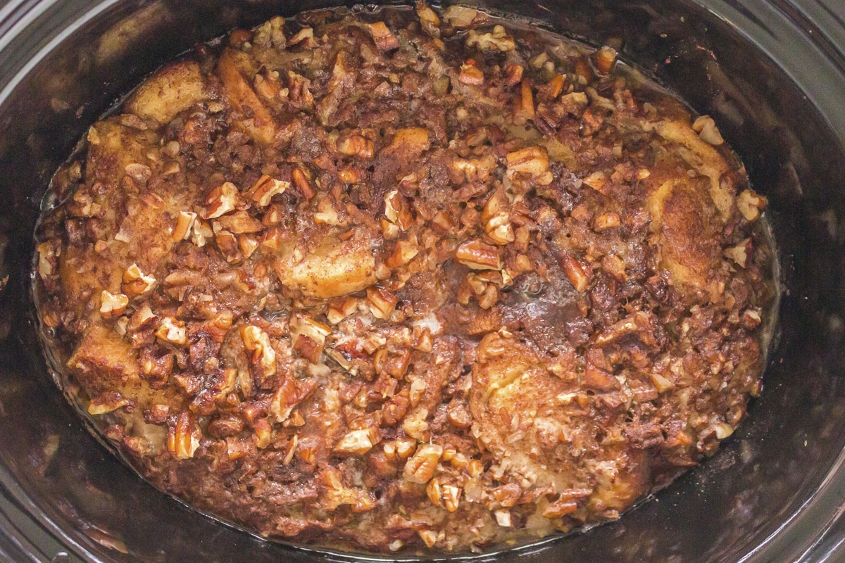 close up of cooked french toast casserole in slow cooker.