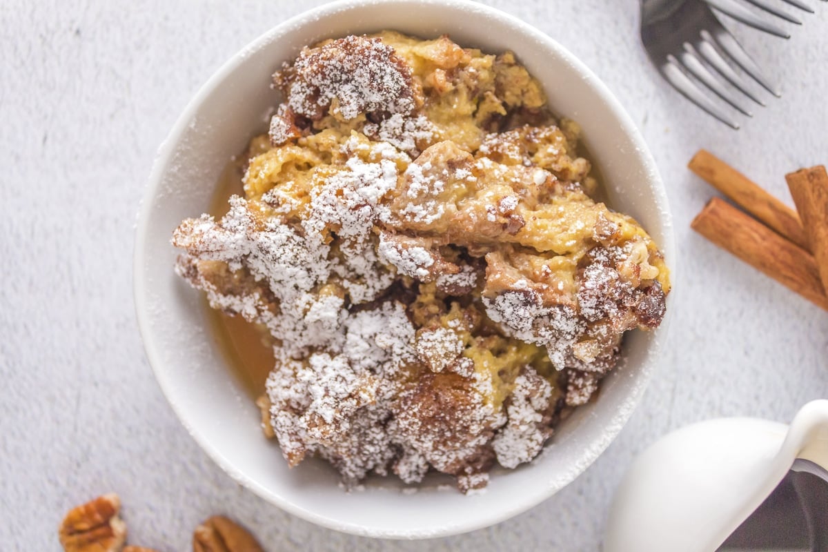 overhead shot of french toast casserole with powdered sugar on top.