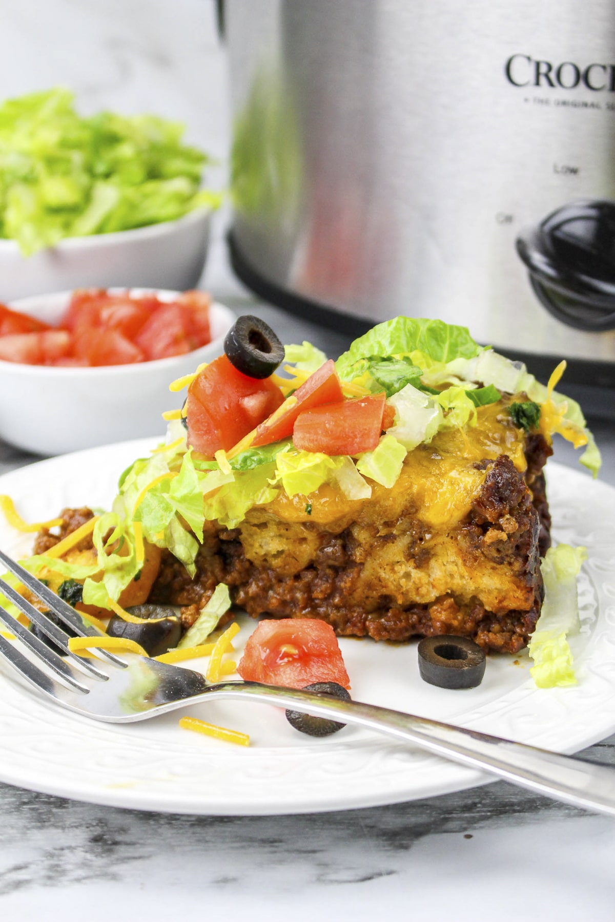 Side view of a slice of bubble up casserole (mexican style).