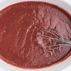 close up of cooked starwberry applesauce.