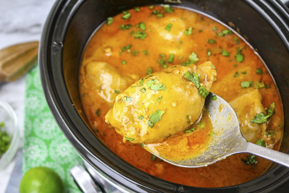 peanut chicken on a spoon.