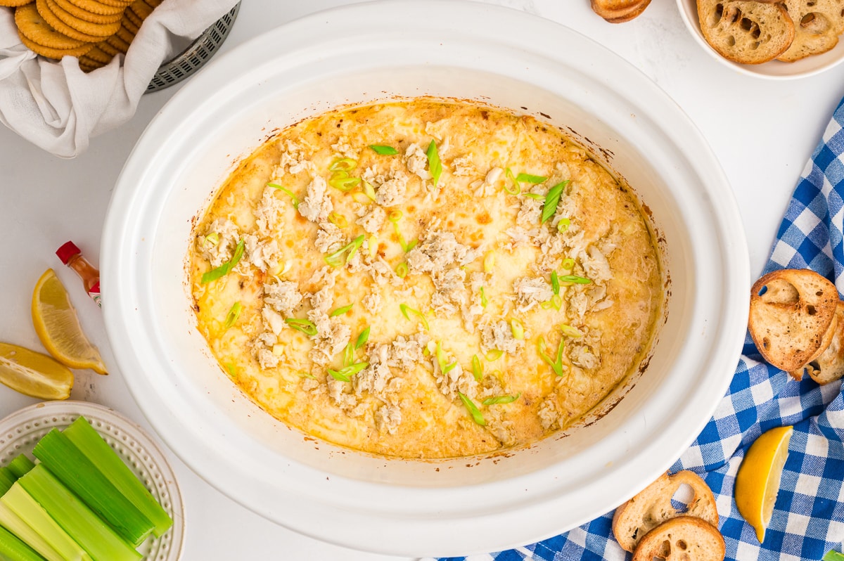 overhead shot of crab dip cooked in slow cooker.